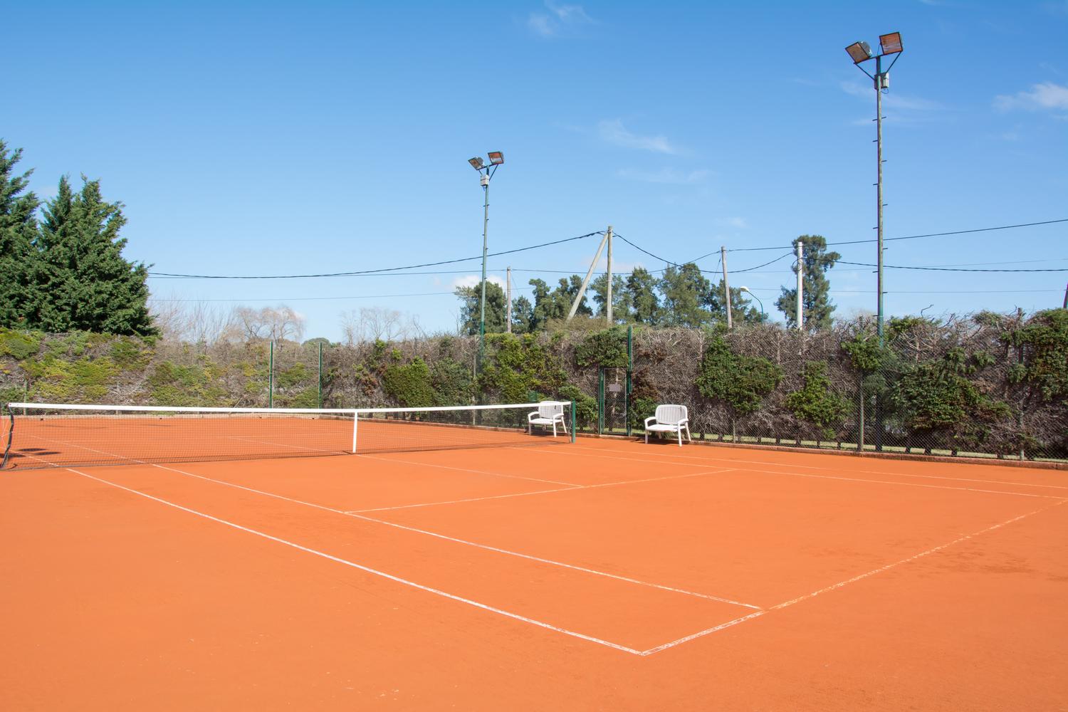 Cancha de Tennis Polvo de Ladrillo