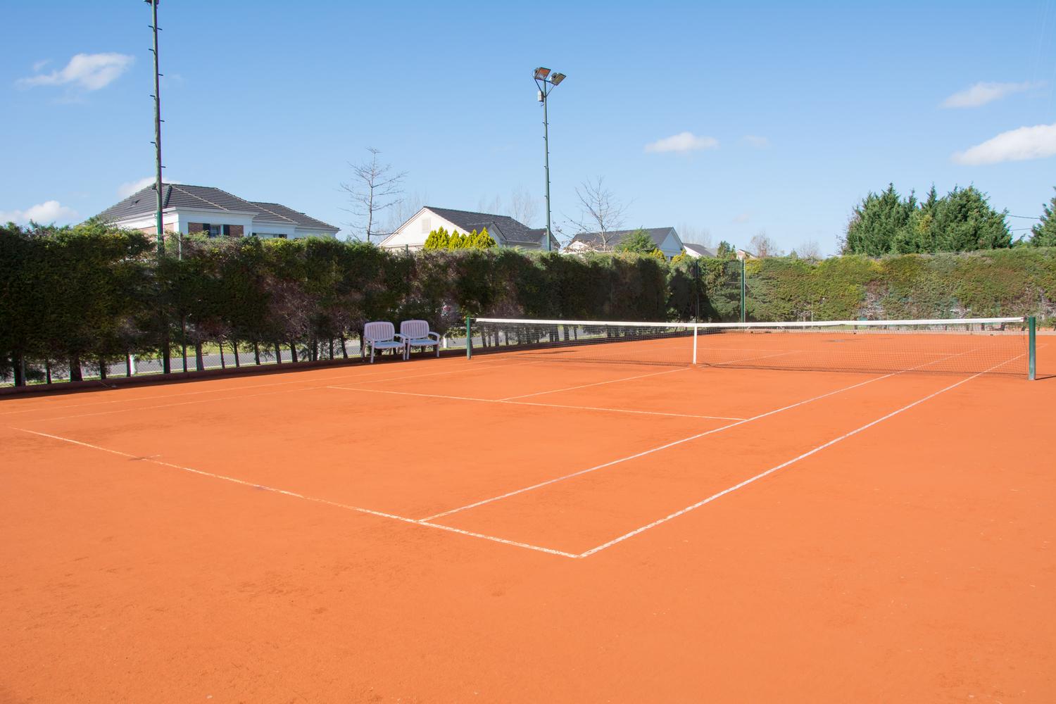 Cancha de Tennis Polvo de Ladrillo