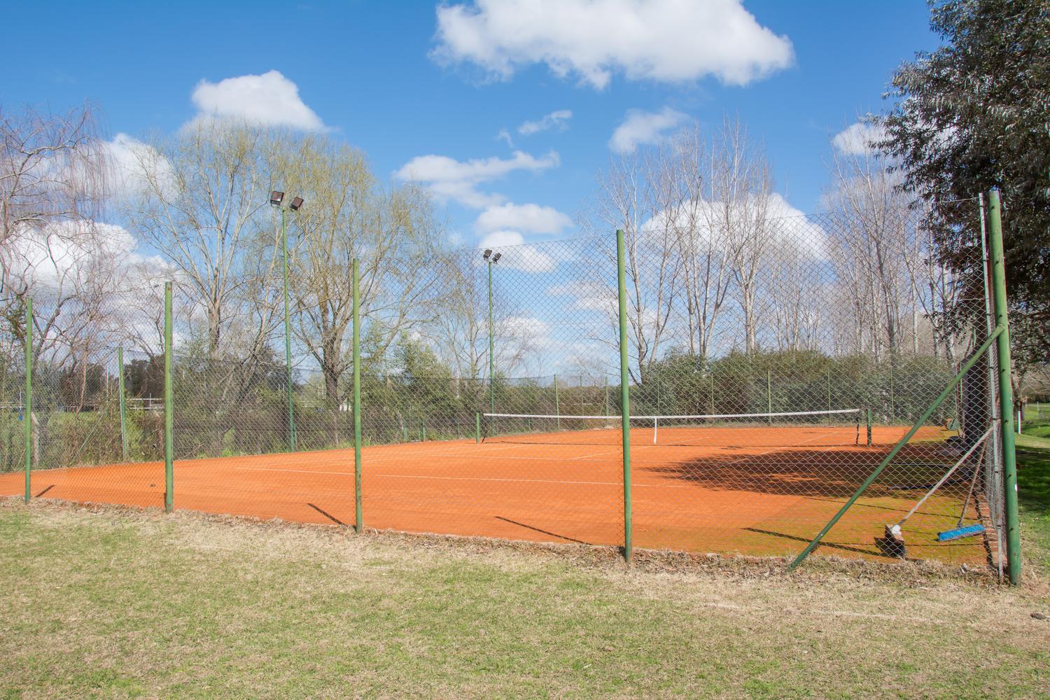 Cancha de Tennis Polvo de Ladrillo