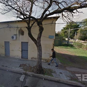 Tres apartamentos y amplio terreno en el Centro