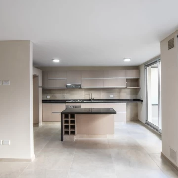 VENTA - Departamento 2 dormitorios con doble balcón. Cochera. Martin, Rosario.