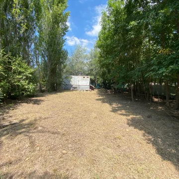 VENTA - Terreno con casa rodante. Prados del Sol, Roldán.