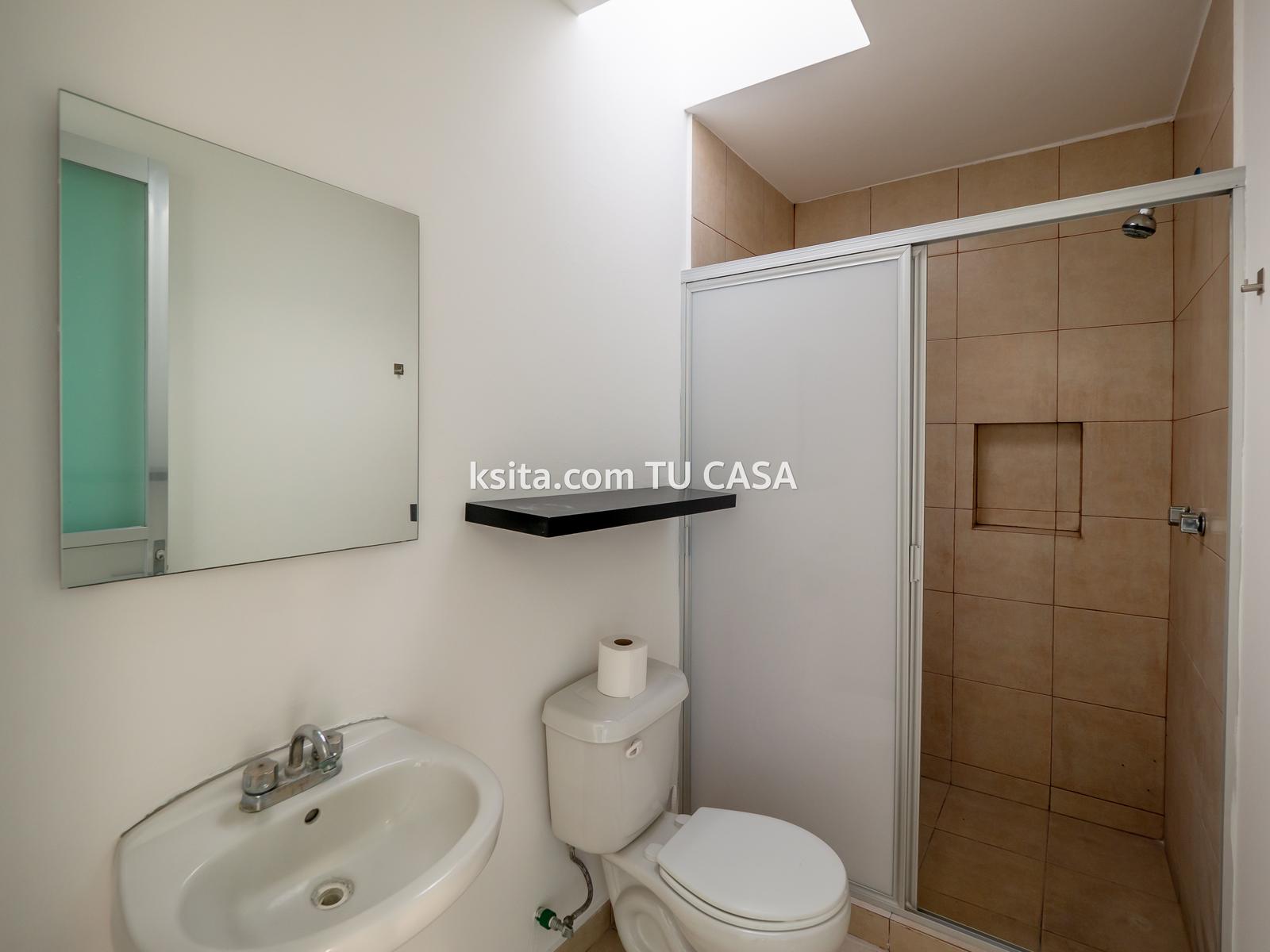 Baño de servicio