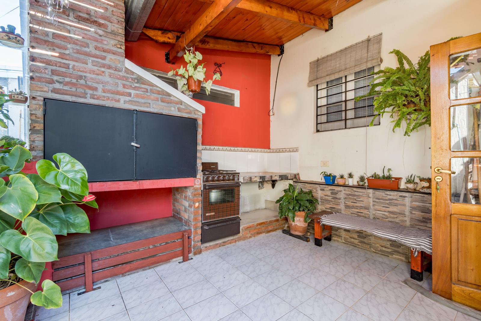 Terraza con parrillero
