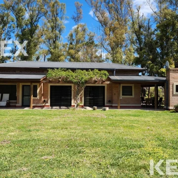 VENTA DE CASA DE 4 DORMITORIOS EN CAMPOS DE ROCA