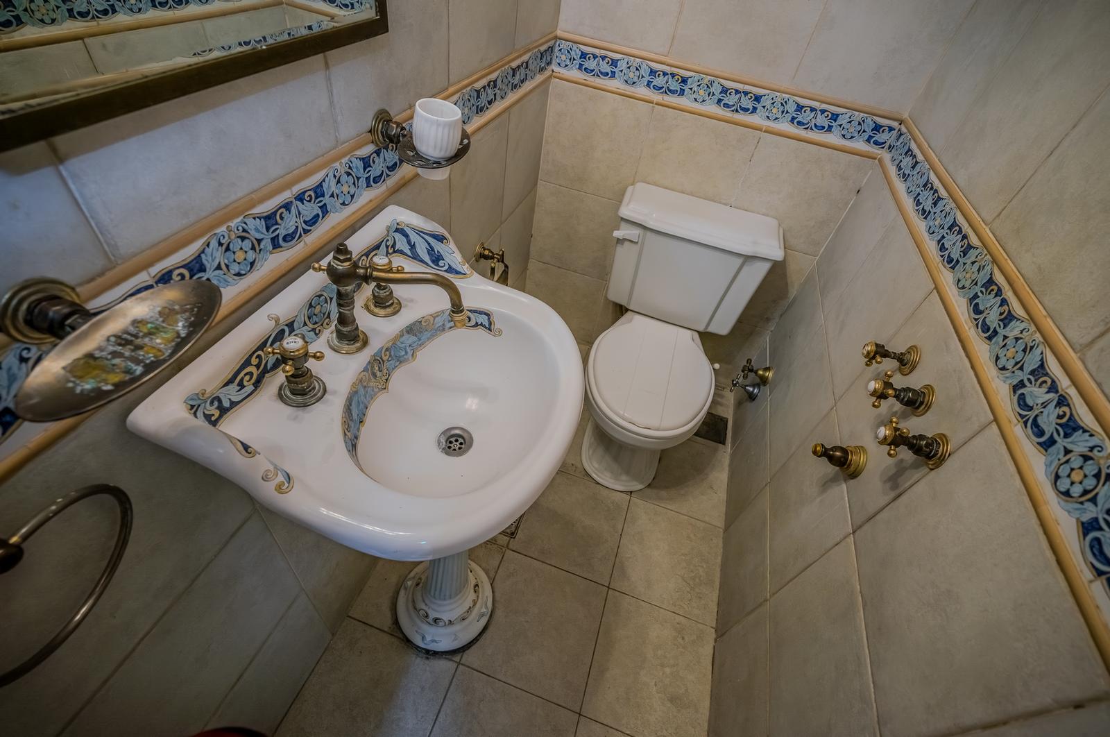 Baño de servicio