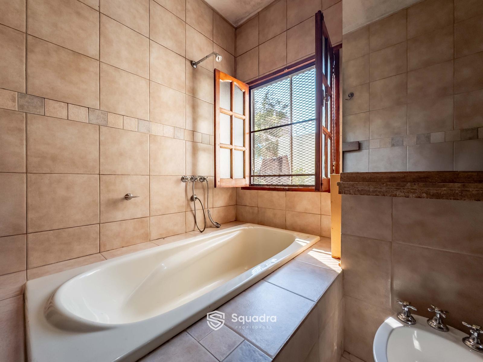 Baño con bañera