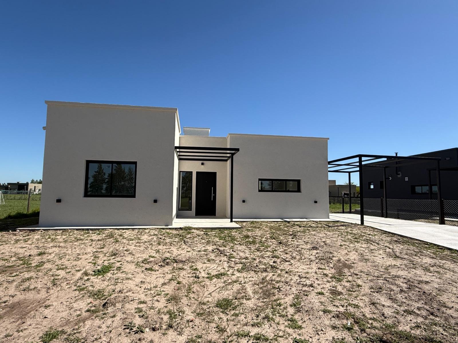 Venta casa en barrio Belleville, cuatro ambientes Canning - Principal