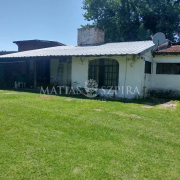 CASA SOBRE LOTE DE 566 METROS CUADRADOS EN VILLA UDAONDO