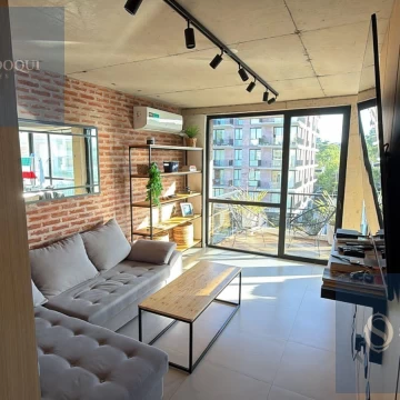 Venta Departamento tres ambientes con balcón terraza y cochera en Centro