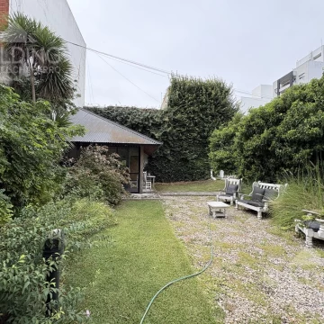 Terreno con construcción en venta