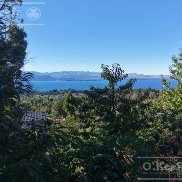 Terreno en venta con vista al lago en km 6 Av Pioneros