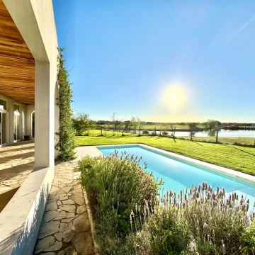 VENTA CASA 6 AMBIENTES A ESTRENAR - VISTA A LAGUNA EN EL CANTON GOLF