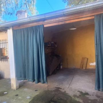 CASA INTERNA  DE 1 DORMITORIO CON COCHERA
