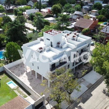 Departamento 2 ambientes con balcon cochera y terraza propia con parrilla a estrenar