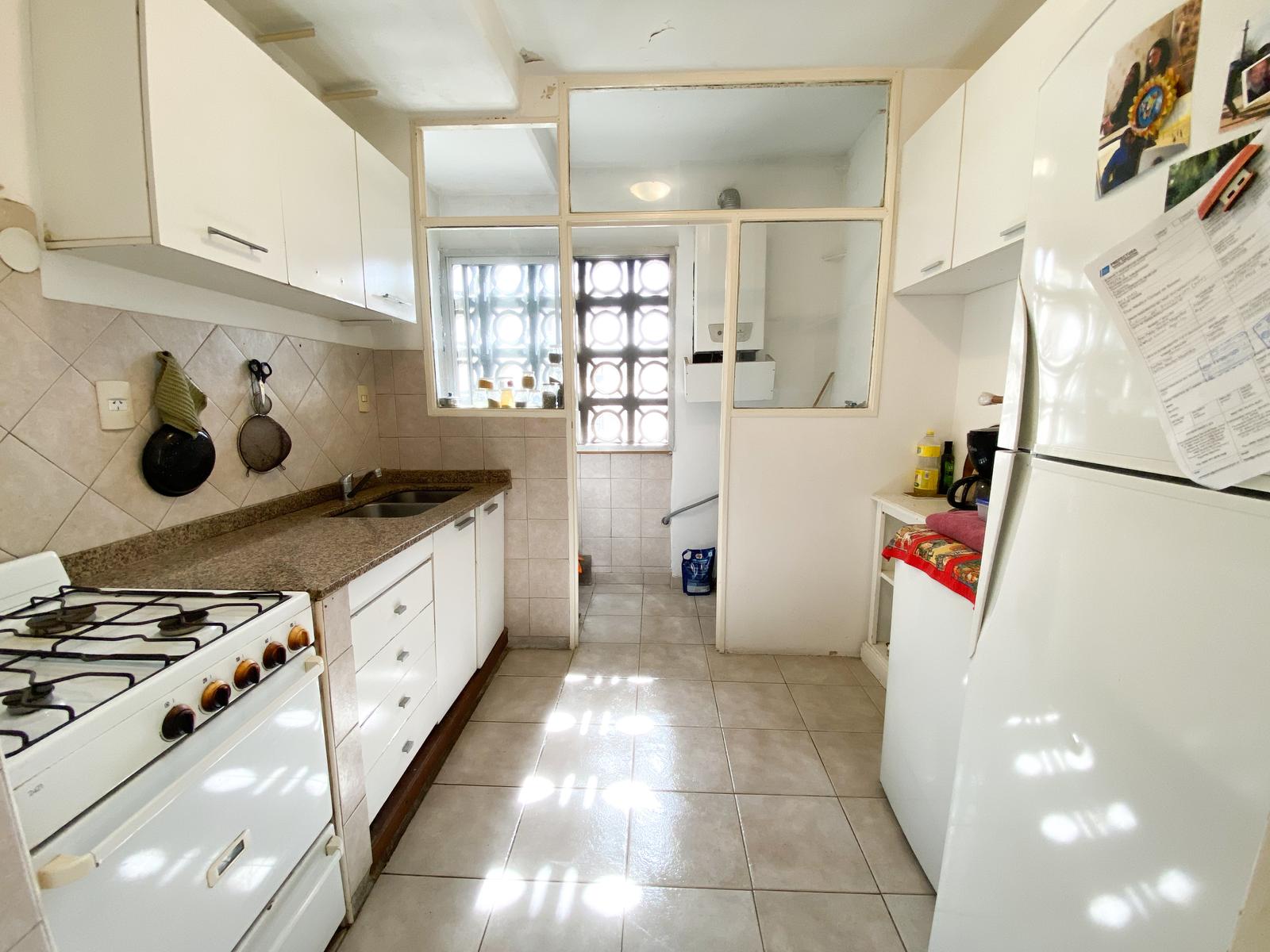 Cocina con lavadero