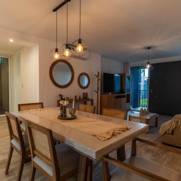 departamento tres ambientes planta baja con patio y cochera en venta en lujan