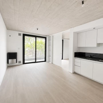 Departamento en  venta 1 dormitorio a estrenar con patio y cochera en Funes - Centro