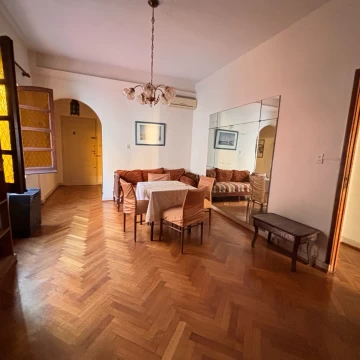 Departamento amoblado con balcón cerrado