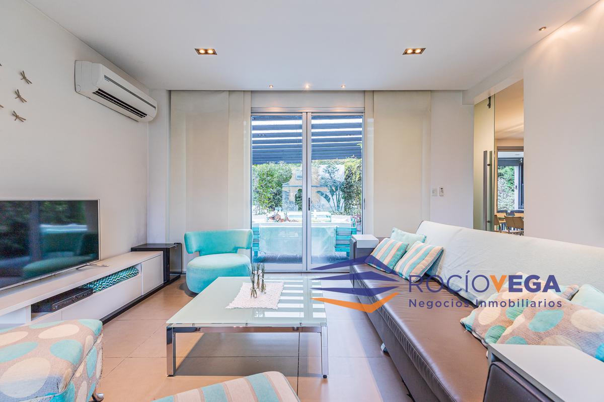 LIVING CON SALIDA AL JARDIN DE INVIERNO