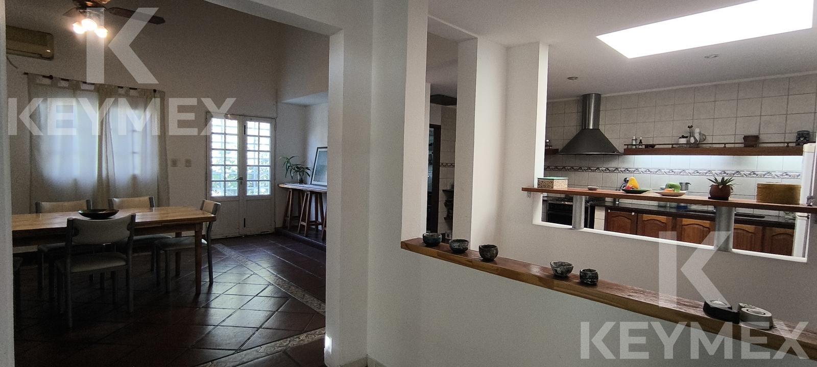 Living comedor — sala principal con mobiliario y cuadro