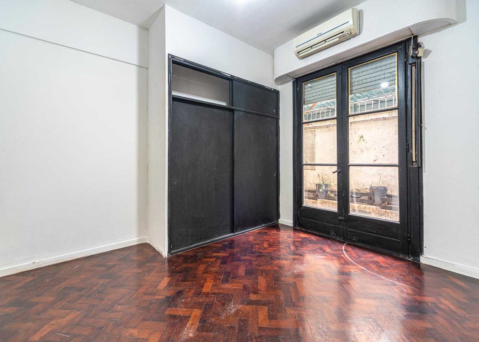 Dormitorio con placard