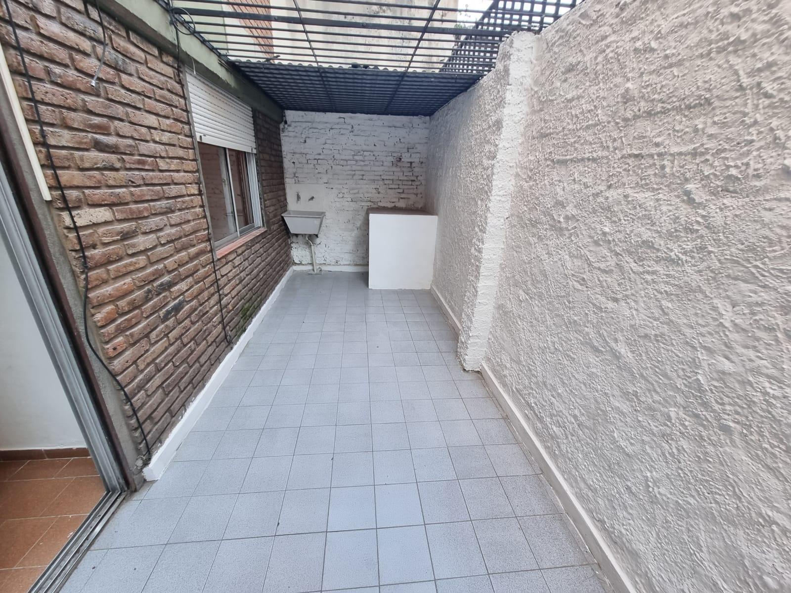patio con lavadero