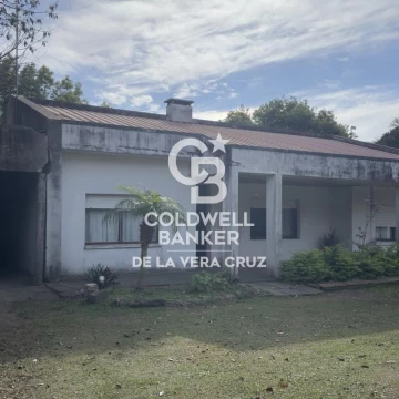 Casa con 10 hectareas en Villa Elisa