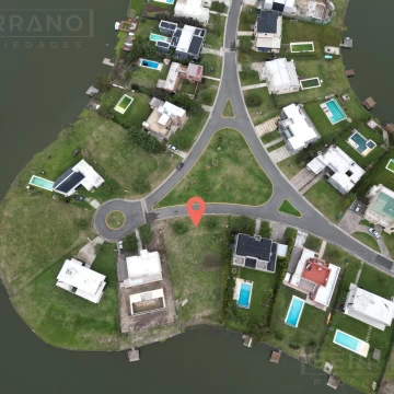 Lote a la laguna en venta, escriturado, Área 6, San Sebastián. Pilar
