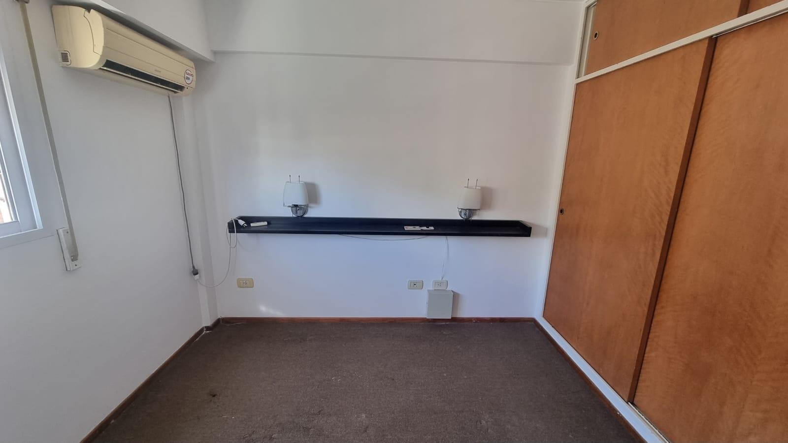 dormitorio con aire ac.