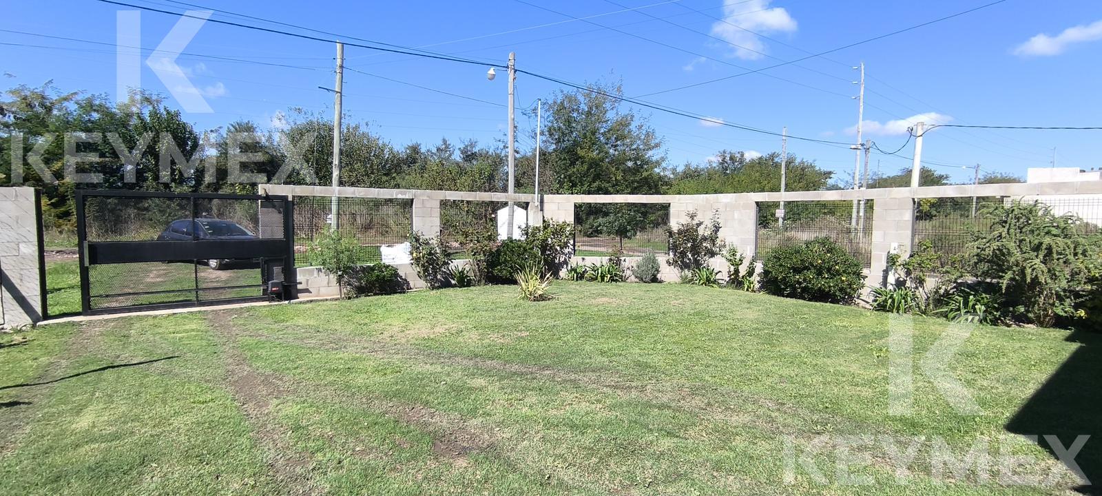 Patio con parrilla y espacio verde
