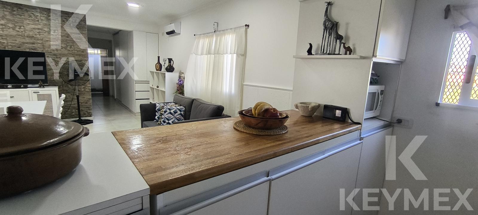 Living integrado con mesa ratona
