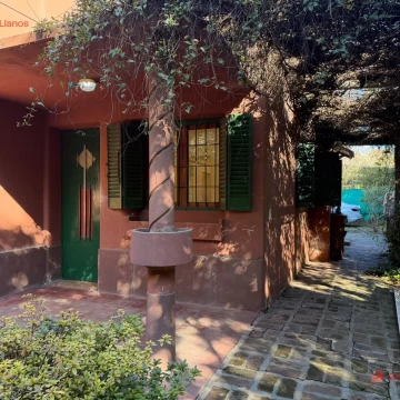 Casa de dos habitaciones en venta en Open Door, amplio patio