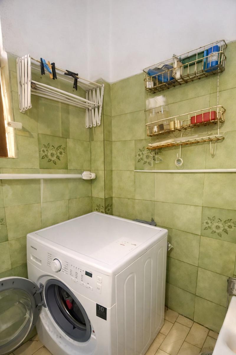 Baño con conexion lavarropas
