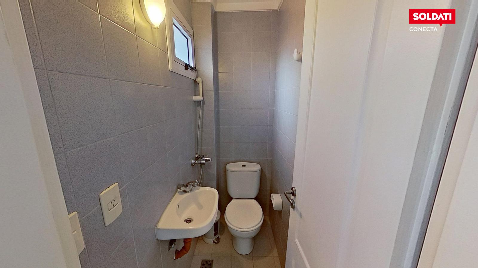 Baño de servicio