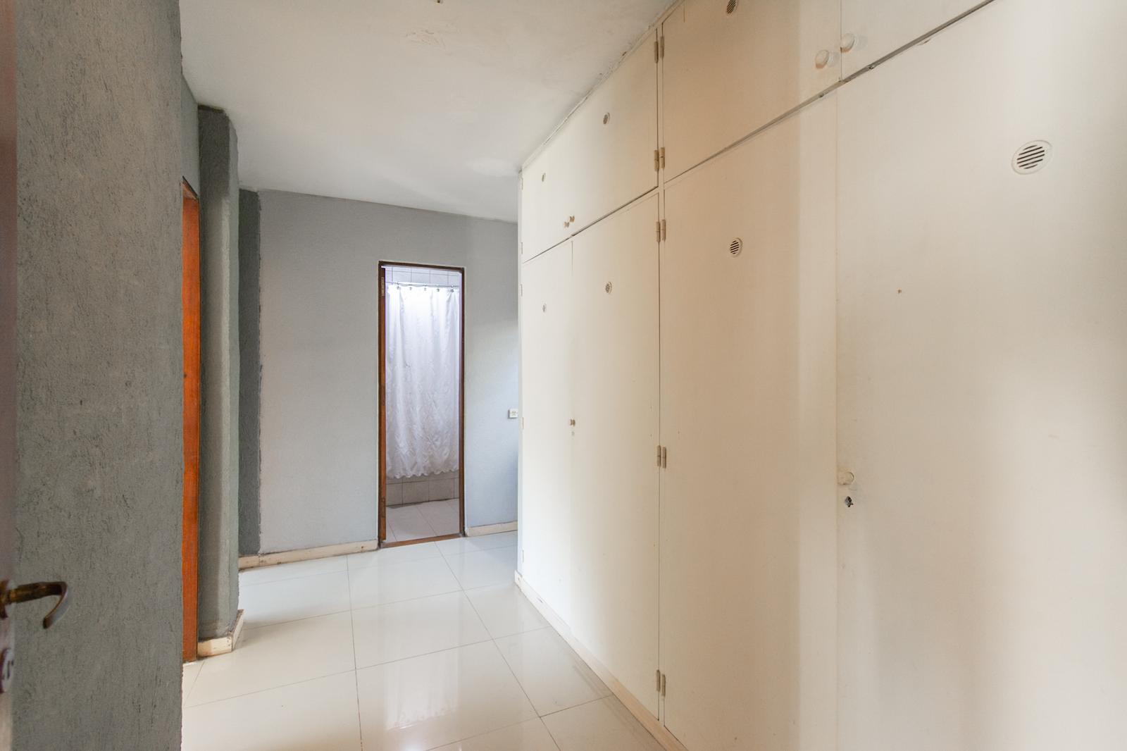 Hall de distribución de habitaciones