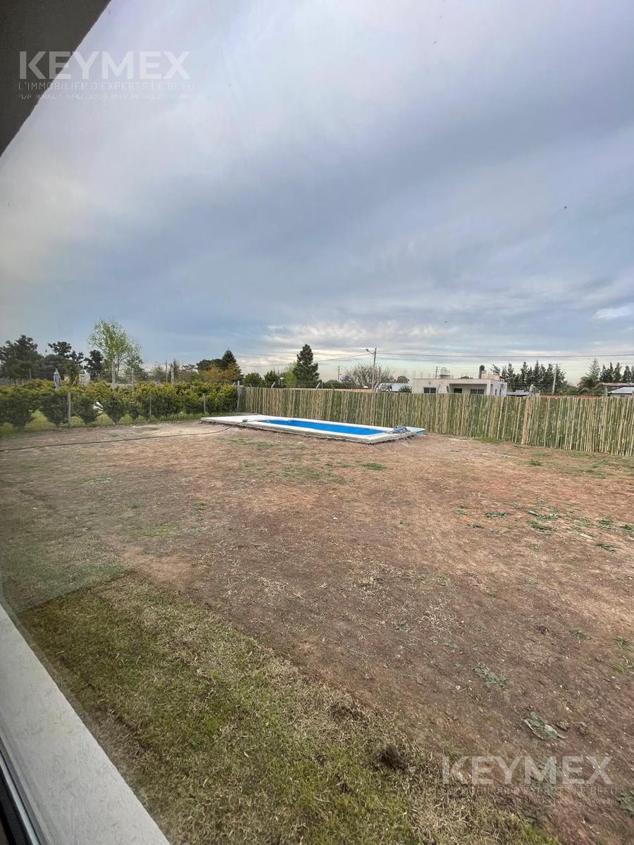 jardín ahora parquizado y pileta