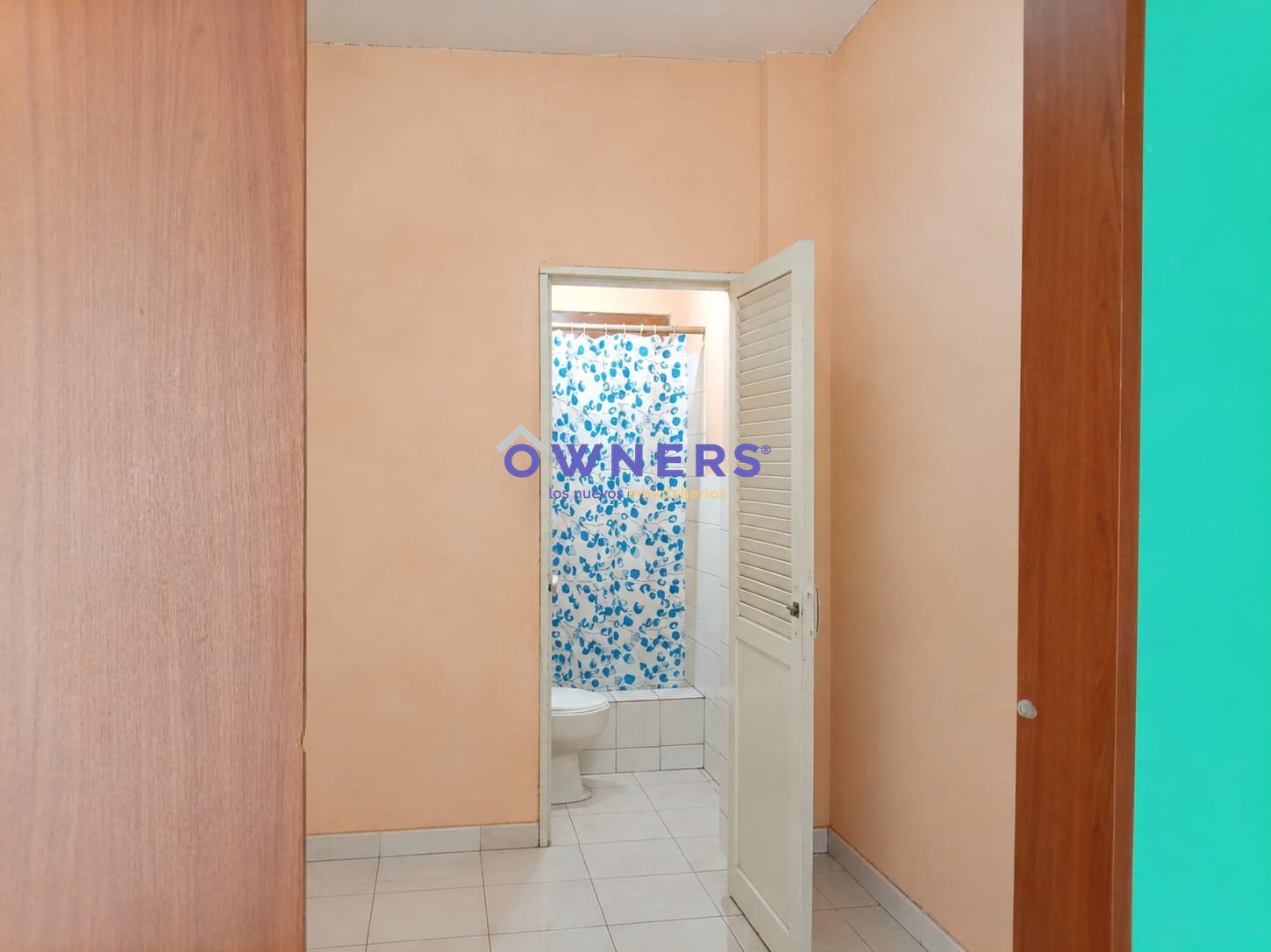 dormitorio y baño de la Suite