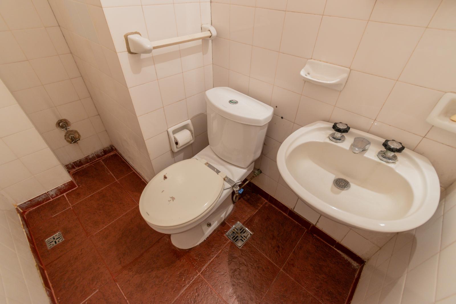 baño de servicio