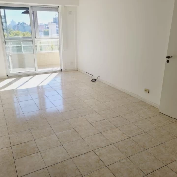 Alquiler departamento sobre Bv. Oroño. 2 dormitorios y cochera