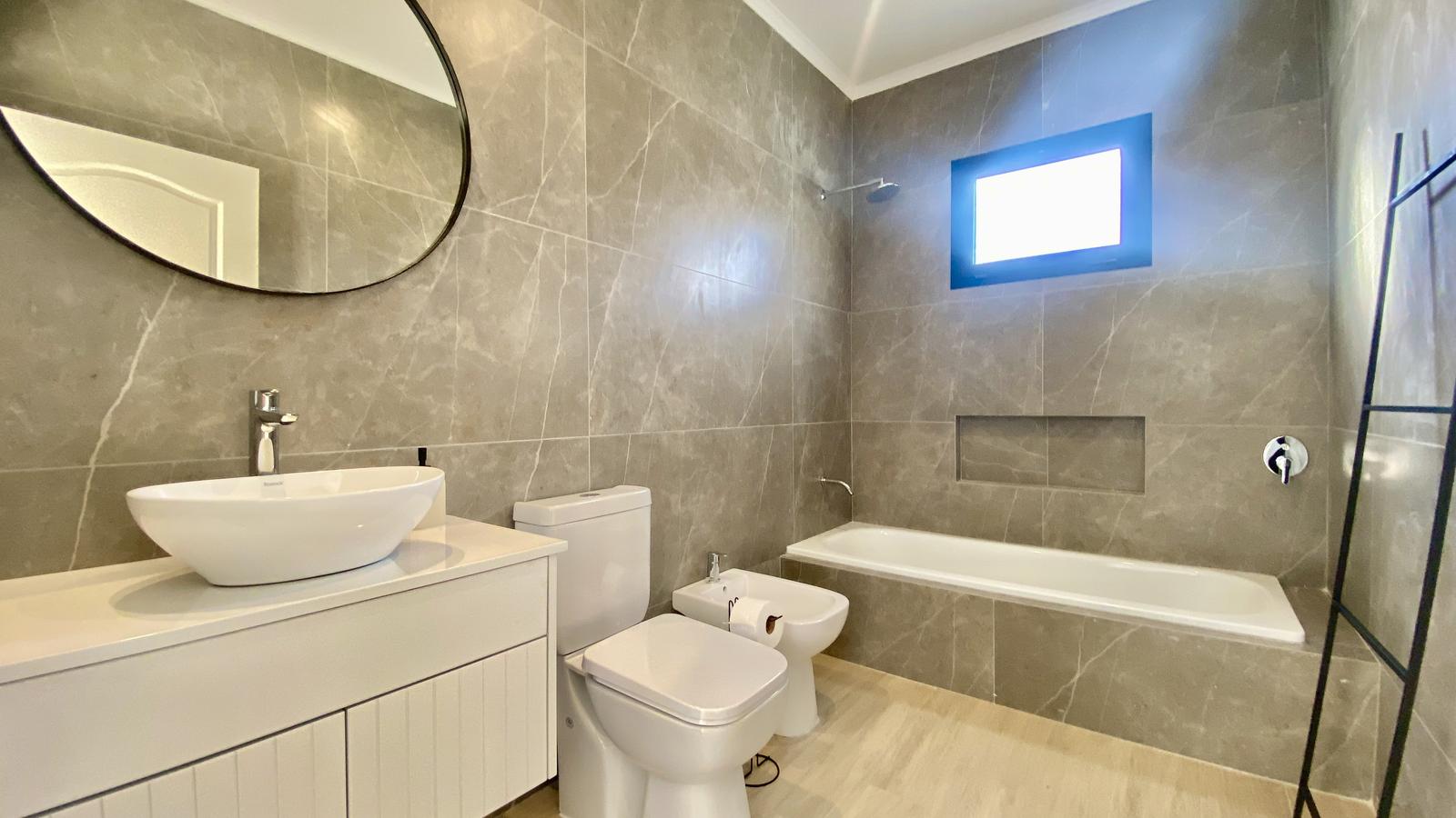 baño compartido