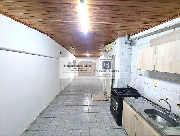 Cocina-Comedor- Garage (Vista desde fondo)