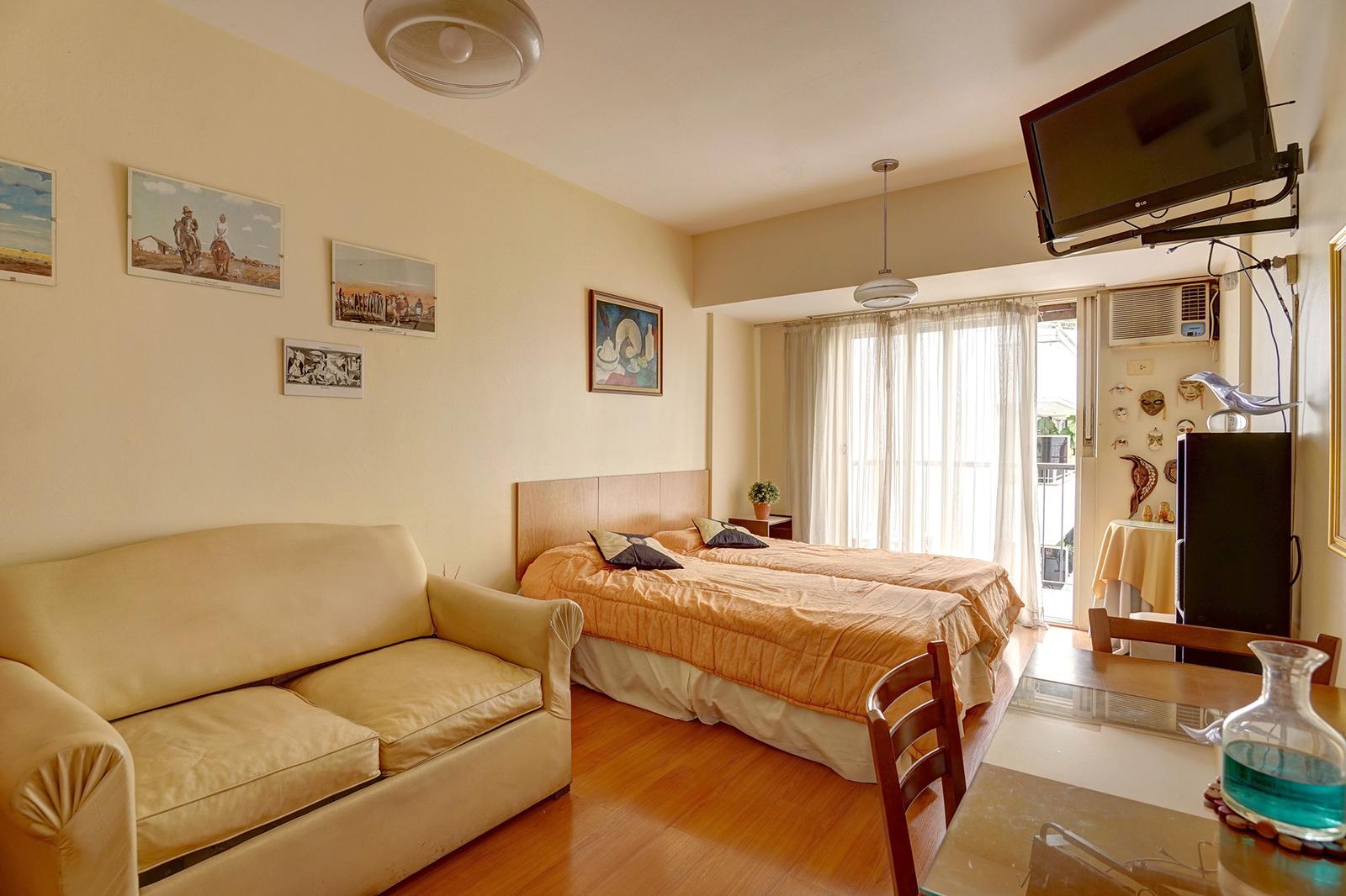 Doble cama y sillón
