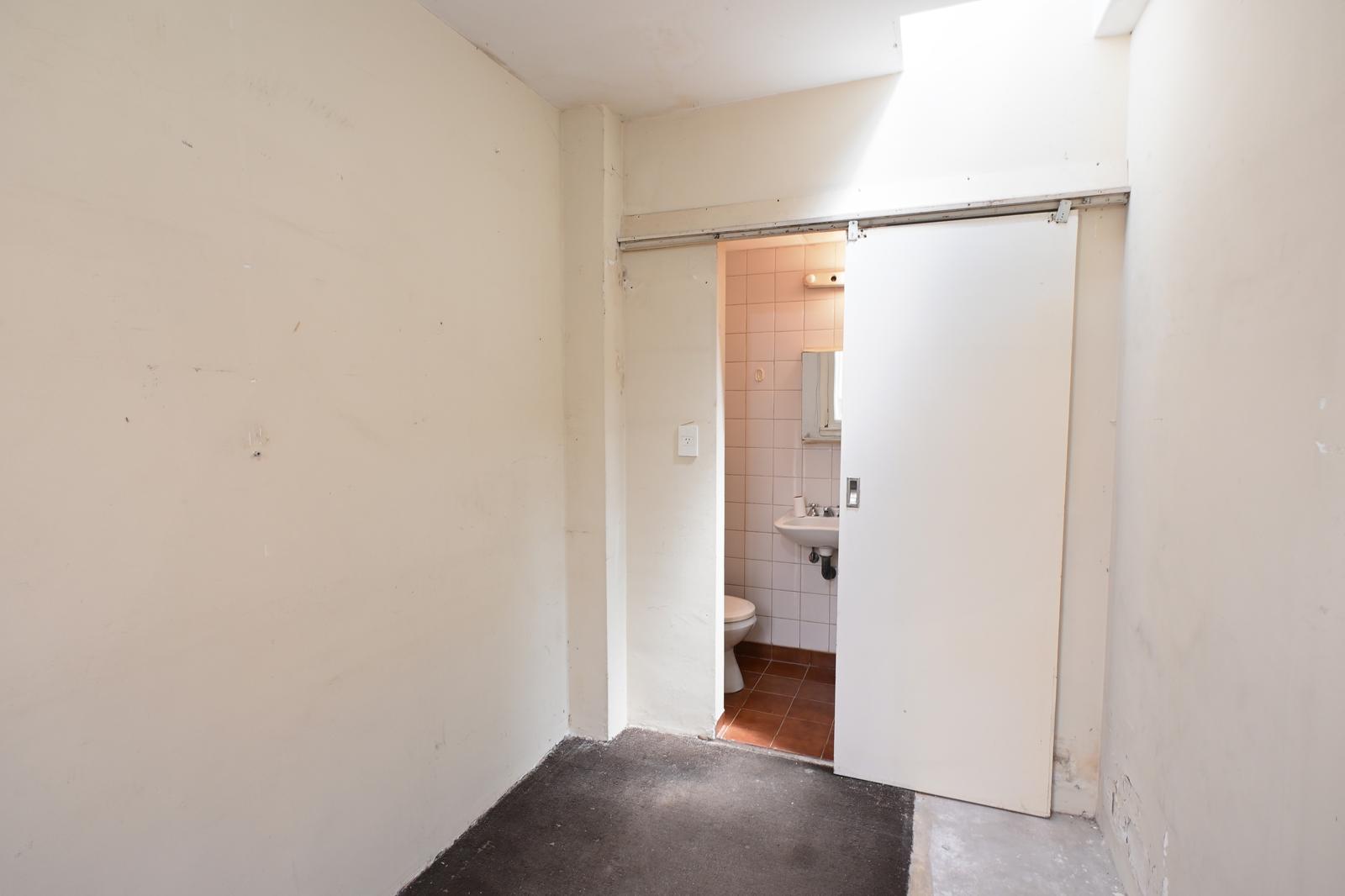 Baño de servicio