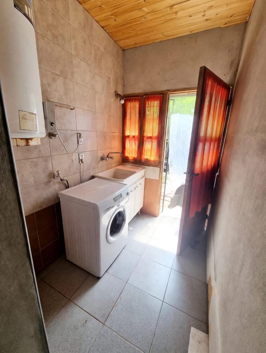 lavadero interno con salida al patio