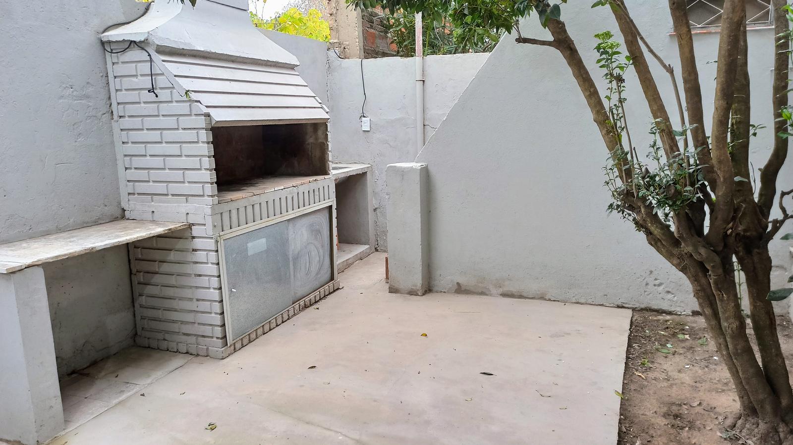 patio y parrillero