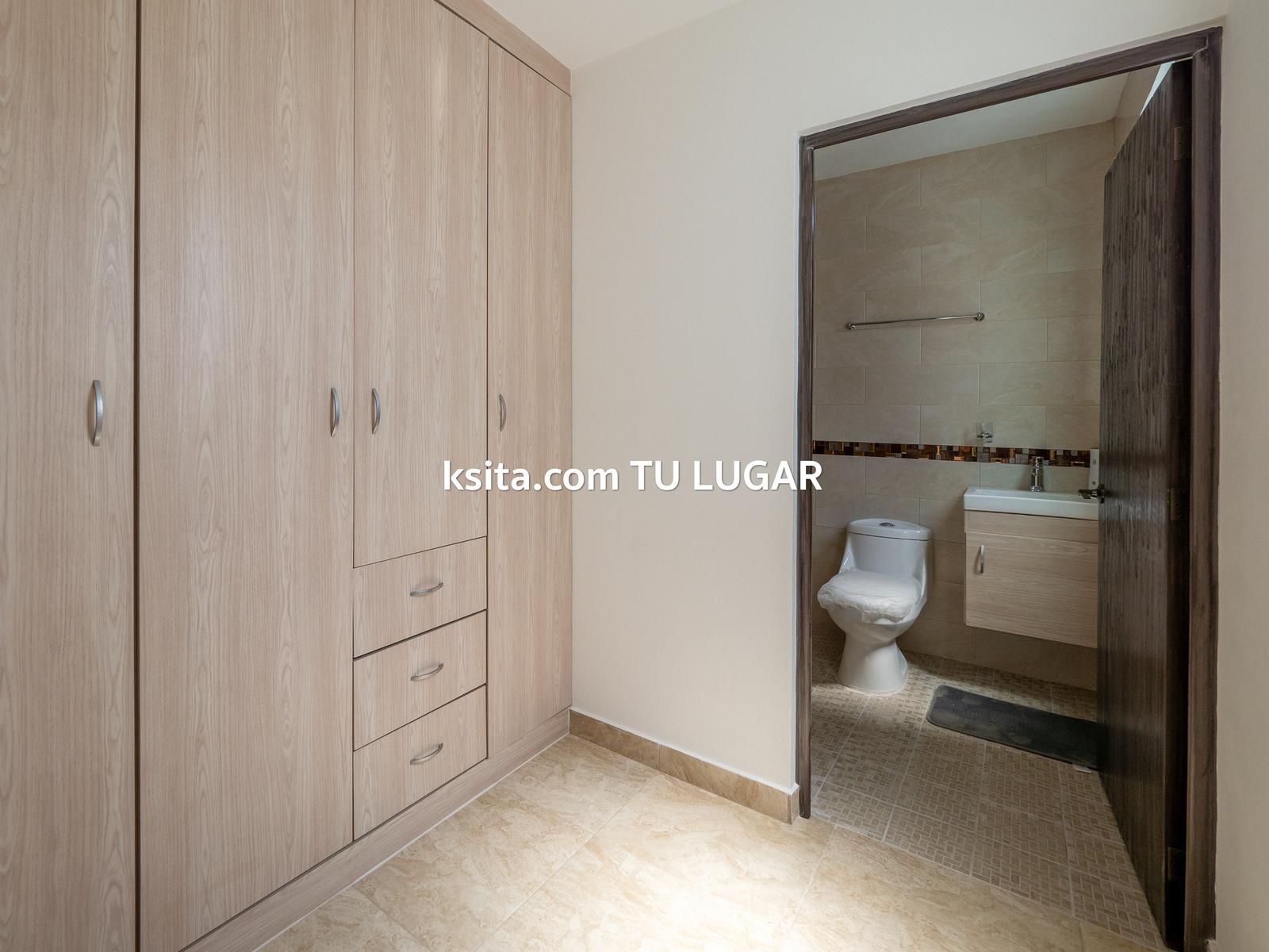 Vestidor y baño